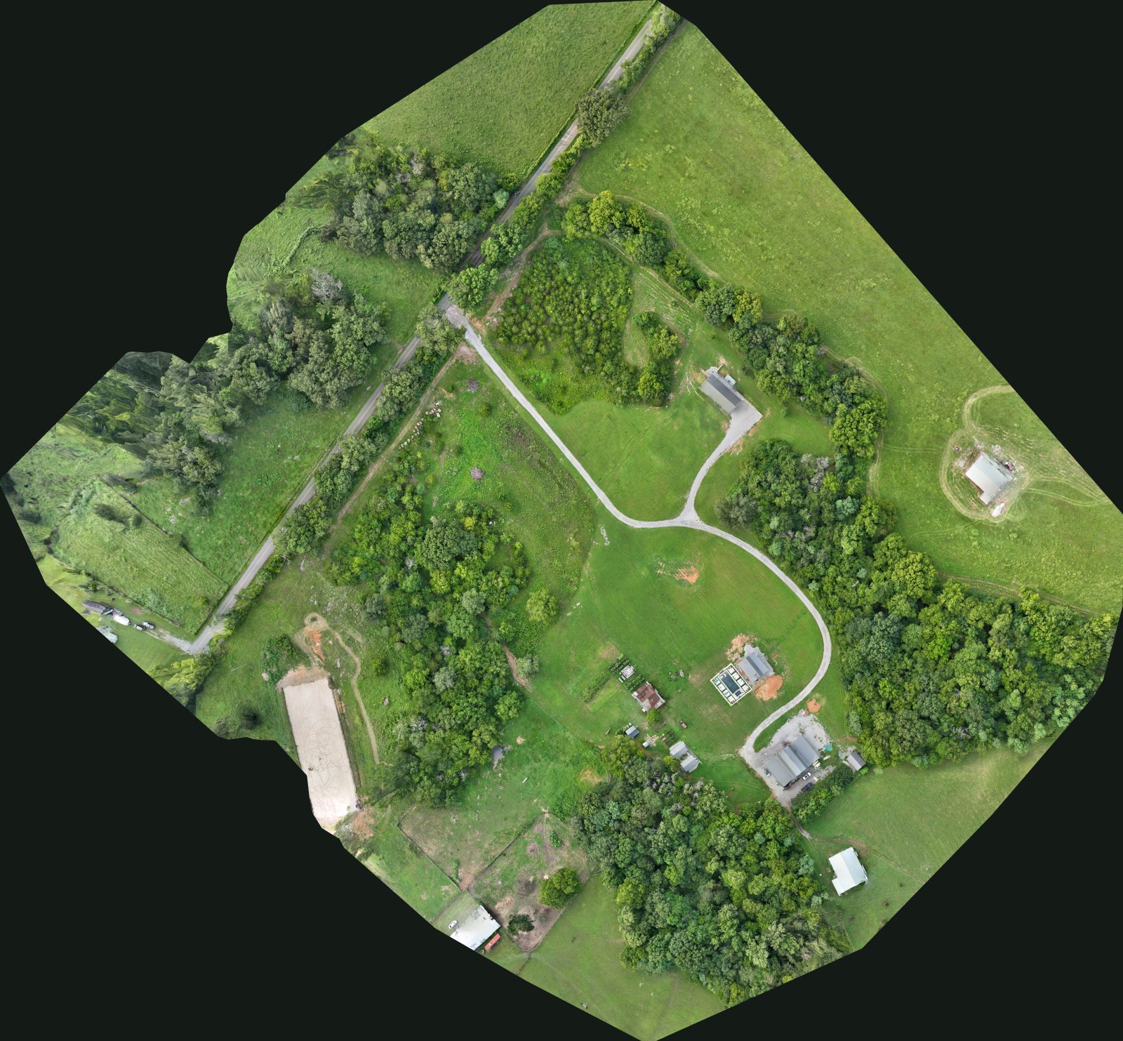 The farm's orthomosaic from the drone survey, slowly turning